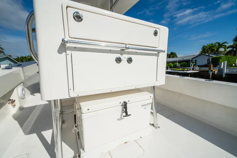 Slide: The Image of 2016 Invincible 36 Open Fisherman boat deck with storage compartments. - 17