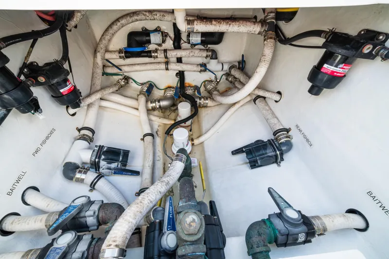 Slide: The Image of Bilge area of 2016 Invincible 36 Open Fisherman with pumps and hoses. - 26