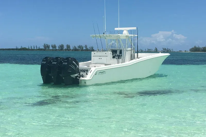 Slide: The Image of 2016 Invincible 36 Open Fisherman boat in clear turquoise water. - 30