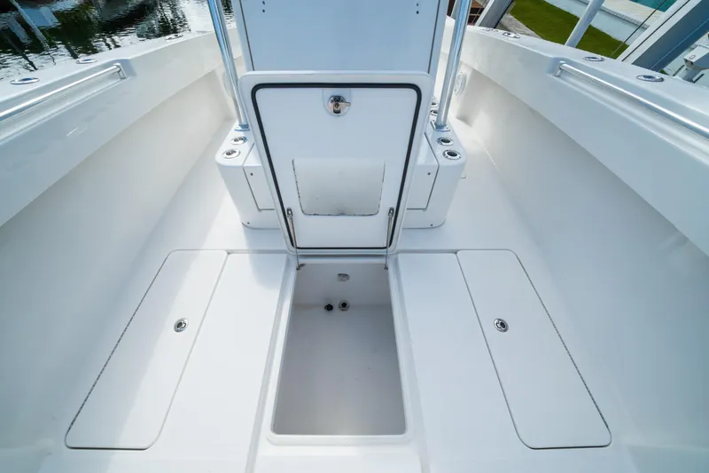 Slide: The Image of 2016 Invincible 36 Open Fisherman boat interior with storage compartments. - 5