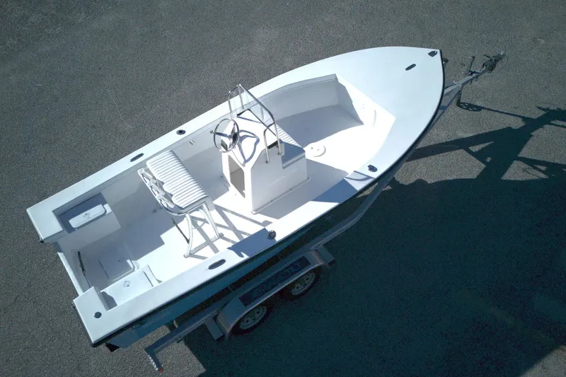 Slide: The Image of 2026 C-Hawk 18 Center Console boat on trailer, aerial view. - 10