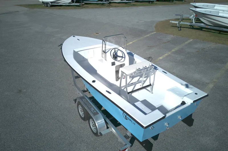 Slide: The Image of 2026 C-Hawk 18 Center Console boat on trailer in parking lot. - 12
