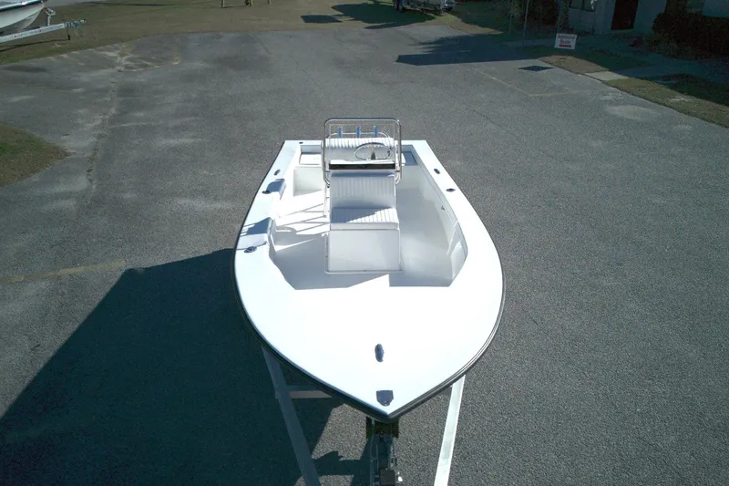 Slide: The Image of 2026 C-Hawk 18 Center Console boat on trailer in parking lot. - 3