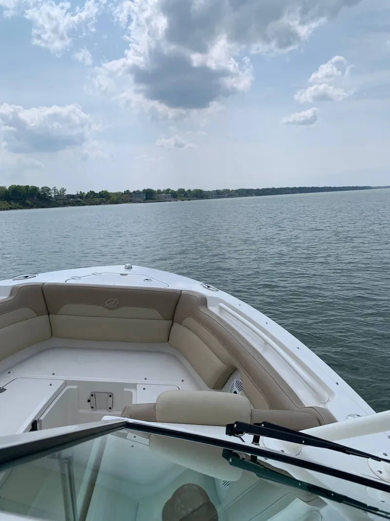 Slide: The Image of Sailfish 245 DC boat on calm water, 2017 model. - 5