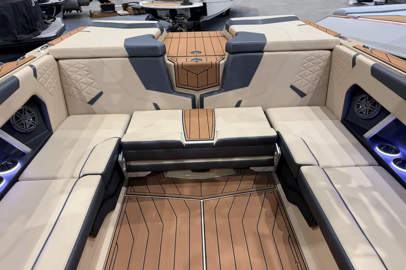 Slide: The Image of 2026 Nautique Super Air Nautique GS24 interior with luxurious seating and modern design. - 7