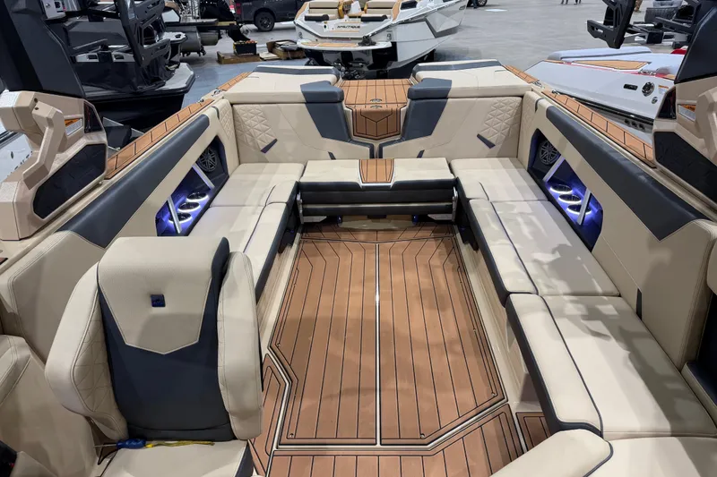 Slide: The Image of 2026 Nautique Super Air Nautique GS24 interior with luxurious seating and modern design. - 9