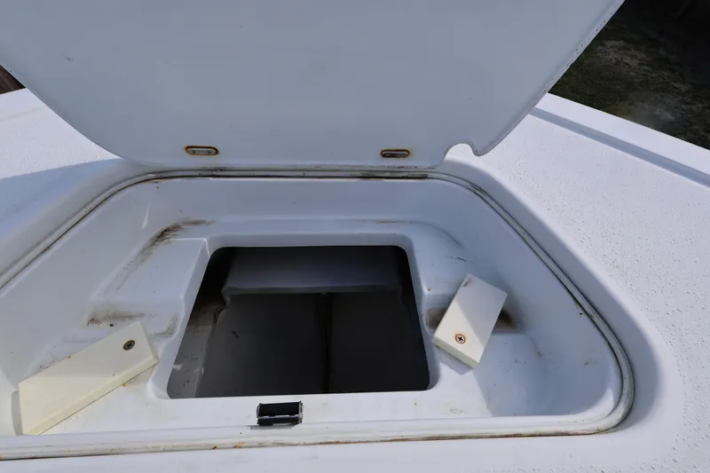 Slide: The Image of Open storage compartment on a 2017 Yellowfin 36 Offshore boat. - 15