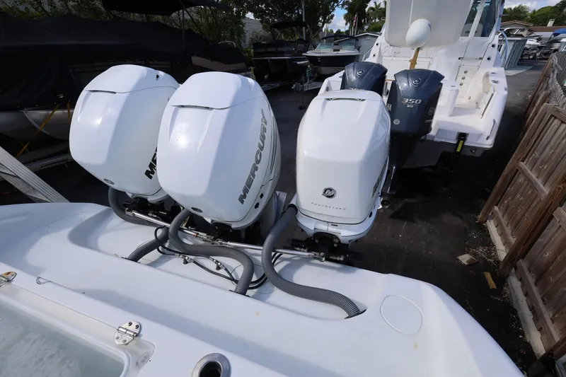 Slide: The Image of 2017 Yellowfin 36 Offshore boat with triple Mercury outboard engines. - 18