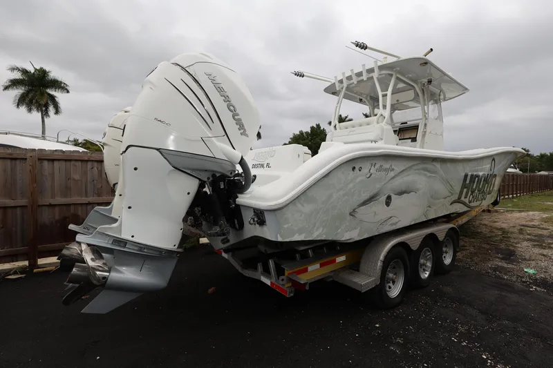 Slide: The Image of 2017 Yellowfin 36 Offshore boat on trailer with Mercury outboard engines. - 4