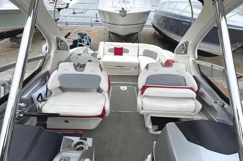 Slide: The Image of 2012 Chaparral 327 SSX boat interior with luxurious seating and modern design. - 14