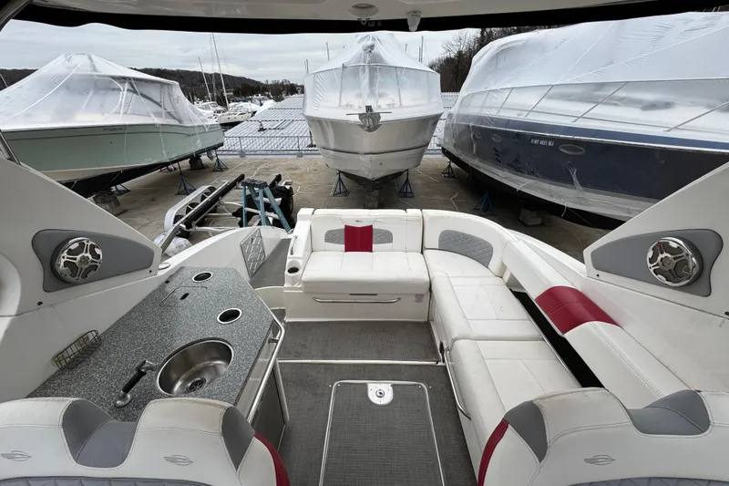 Slide: The Image of Interior view of 2012 Chaparral 327 SSX boat with seating and kitchenette. - 16