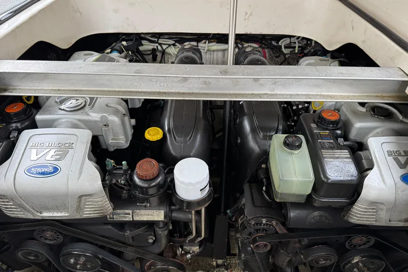 Slide: The Image of Engine compartment of a 2012 Chaparral 327 SSX with dual Big Block V8 engines. - 28