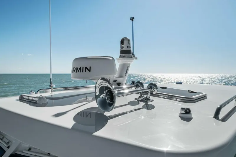 Slide: The Image of 2026 MJM 47R yacht with Garmin equipment on deck, ocean view. - 37
