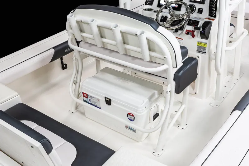 Slide: The Image of Manufacturer Provided Image: 2022 Robalo 246 Cayman SD boat interior with seating and cooler. - 12