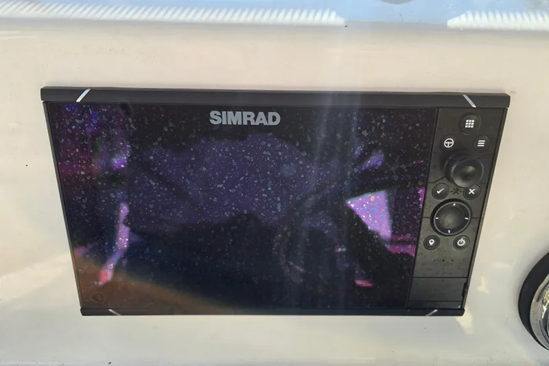 Slide: The Image of Simrad display on 2022 Robalo 246 Cayman SD boat dashboard. - 4