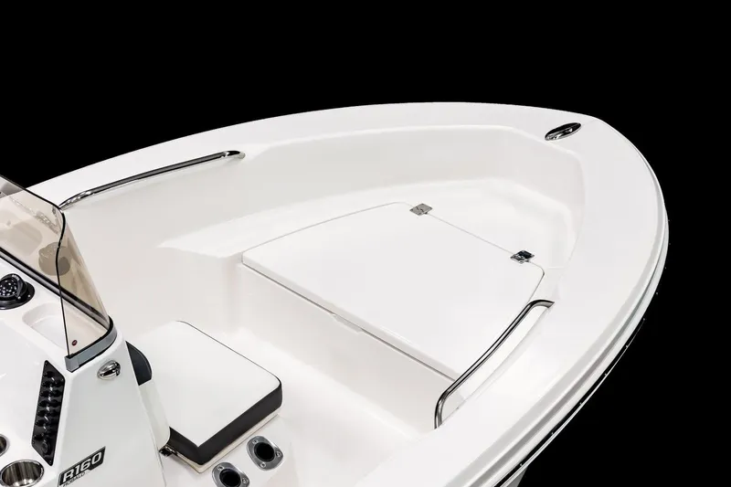 Slide: The Image of Manufacturer Provided Image: 2026 Robalo R160 Center Console boat, sleek white design, spacious deck, modern features. - 3