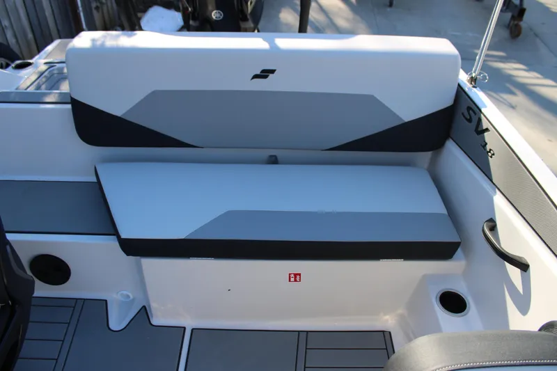 Slide: The Image of 2026 Starcraft SV 18 OB boat interior with modern seating and sleek design. - 11