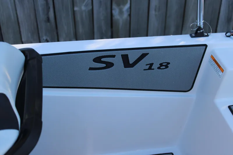 Slide: The Image of 2026 Starcraft SV 18 OB boat interior detail with model branding. - 17