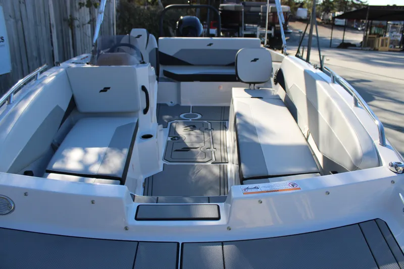 Slide: The Image of 2026 Starcraft SV 18 OB boat interior with spacious seating and modern design. - 27