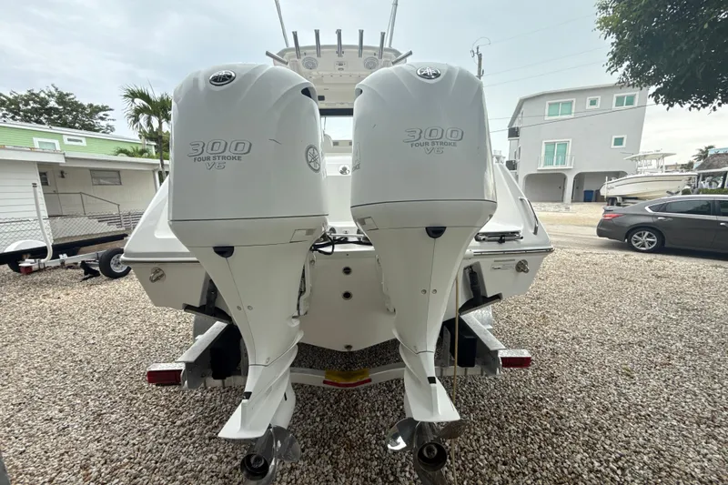 Slide: The Image of 2016 Everglades 295 Center Console with twin 300 horsepower outboard engines. - 5