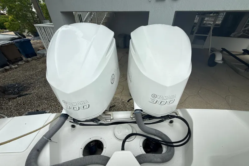Slide: The Image of Twin Yamaha 300 engines on a 2016 Everglades 295 Center Console boat. - 7