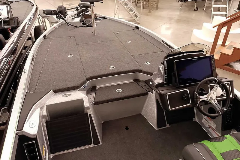 Slide: The Image of 2026 Ranger Z521 boat interior with advanced dashboard and spacious deck layout. - 10