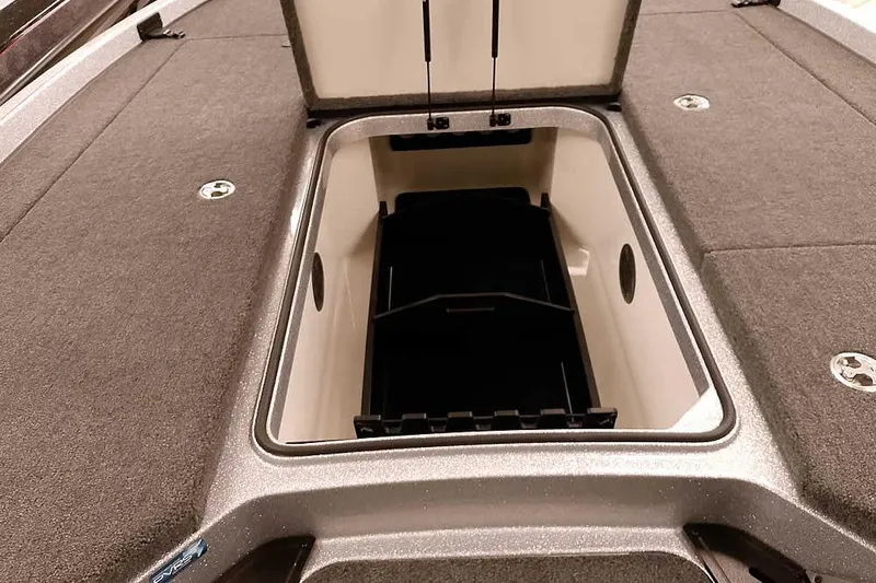 Slide: The Image of Open storage compartment on 2026 Ranger Z521 boat deck. - 12