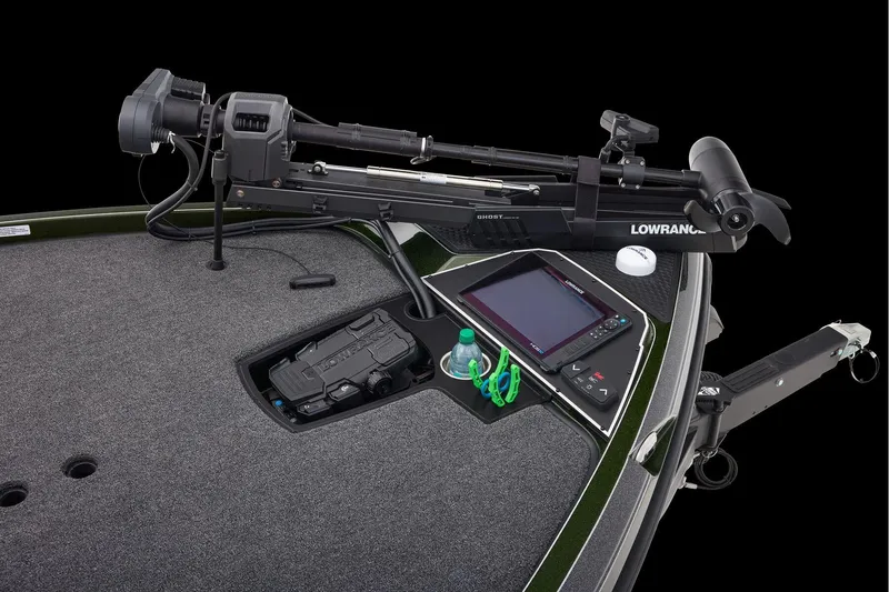 Slide: The Image of Open storage compartment on 2026 Ranger Z521 boat, featuring carpeted interior. - 14