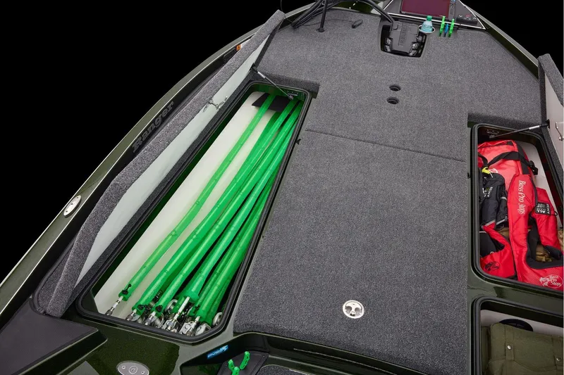 Slide: The Image of 2026 Ranger Z521 boat deck with Minn Kota trolling motor and Lowrance fishfinder. - 17