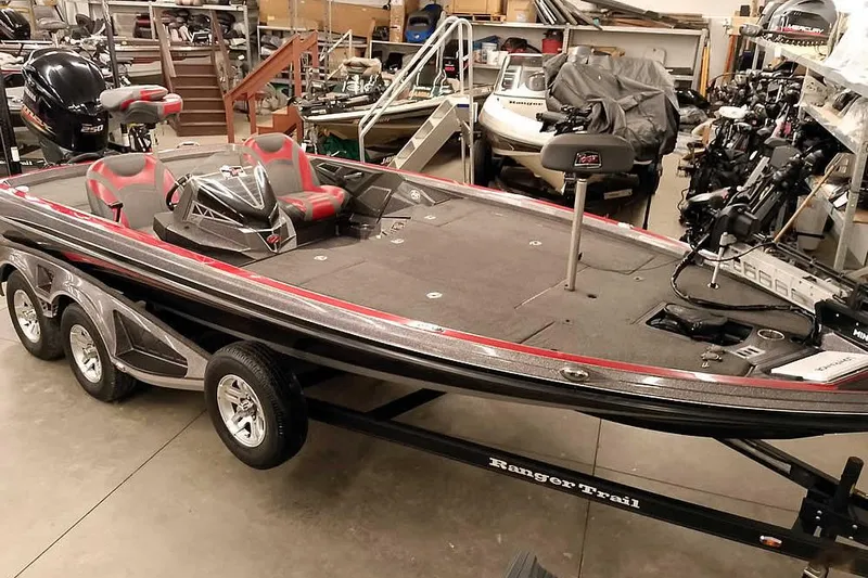 The Image of 2021 Ranger Z520L bass boat in showroom, featuring sleek design and advanced equipment. - 19