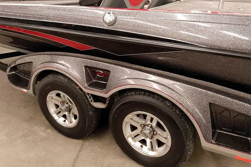 Slide: The Image of 2021 Ranger Z520L boat trailer with dual axles and metallic finish. - 28