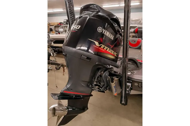 Slide: The Image of 2021 Ranger Z520L with Yamaha VMAX 250 outboard motor in a garage setting. - 31