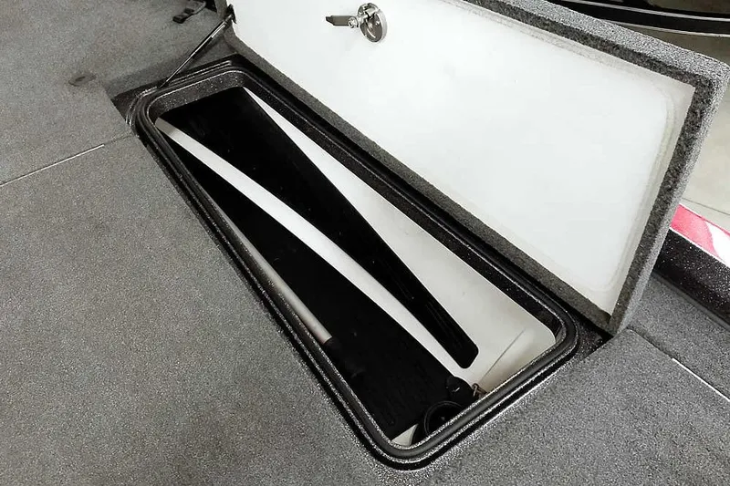 Slide: The Image of Open storage compartment in 2021 Ranger Z520L boat, showcasing interior space. - 40