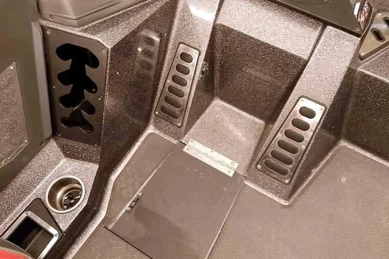 Slide: The Image of Interior of 2021 Ranger Z520L boat with storage compartments and cup holder. - 50