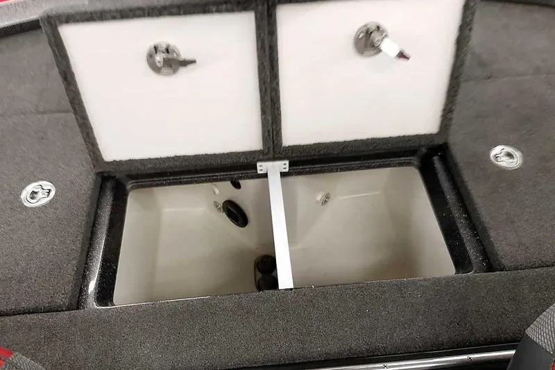 Slide: The Image of 2021 Ranger Z520L boat storage compartments with open lids, showcasing interior space. - 56