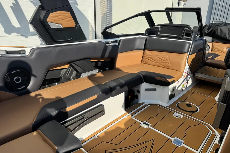 Slide: The Image of Interior of 2026 Supra SV 575 boat with luxurious seating and modern design. - 9