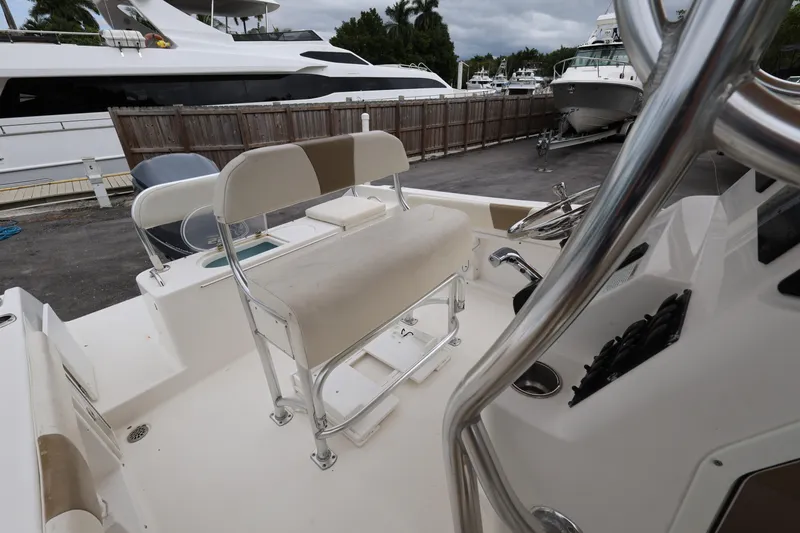 Slide: The Image of 2018 Century 2200 Center Console boat interior with seating and controls. - 21
