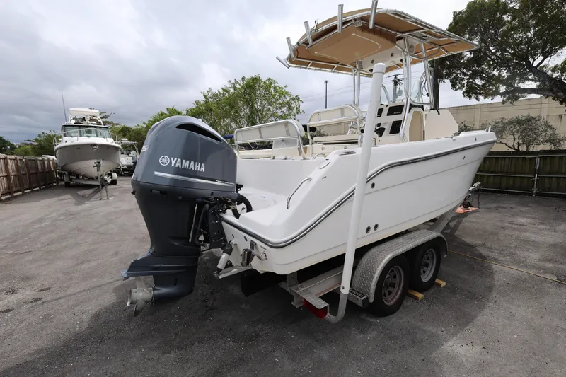 Slide: The Image of 2018 Century 2200 Center Console boat with Yamaha outboard motor on trailer. - 6