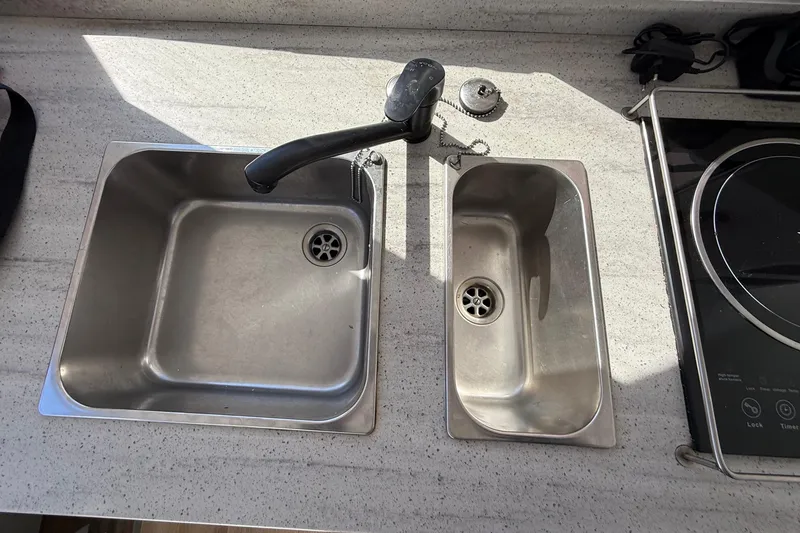 Slide: The Image of Stainless steel double sink and faucet in Schionning 1850 S, 2023 model. - 16