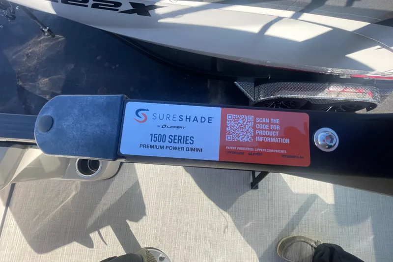 Slide: The Image of 2026 Harris Cruiser 210 with SureShade 1500 Series Premium Power Bimini label. - 17