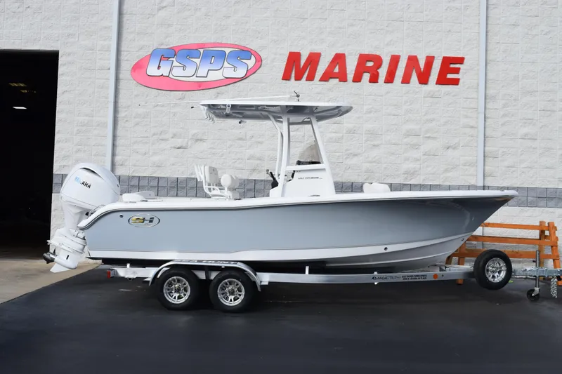 The Image of 2026 Sea Hunt Ultra 219 boat on trailer at GSPS Marine dealership. - 1