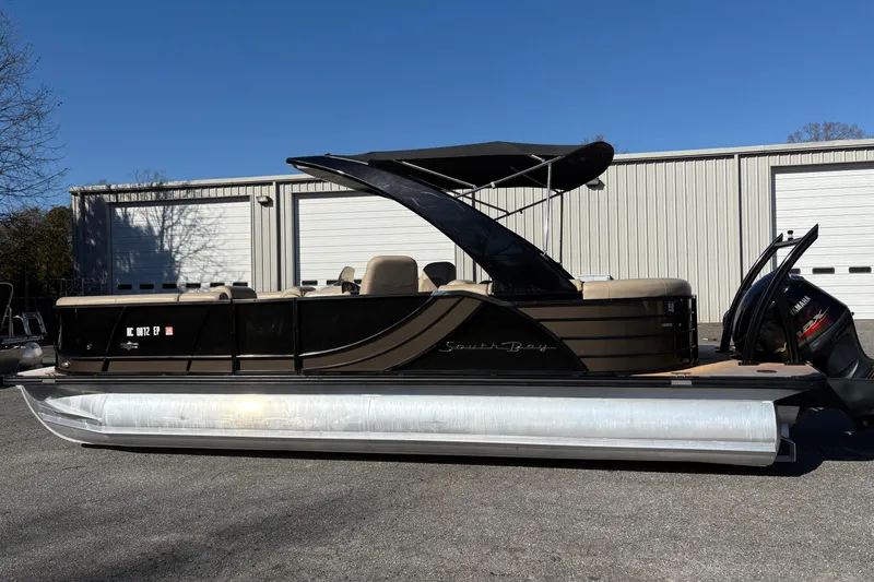 The Image of 2019 South Bay 525 RS 3.0 Arch pontoon boat with Yamaha engine, parked outdoors. - 0