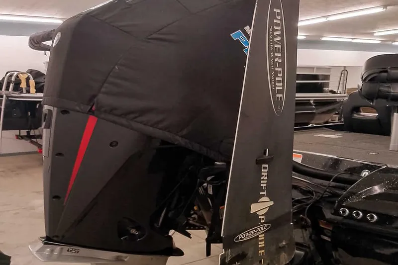 Slide: The Image of 2022 Nitro Z20 boat with Power-Pole anchor system in a garage setting. - 14