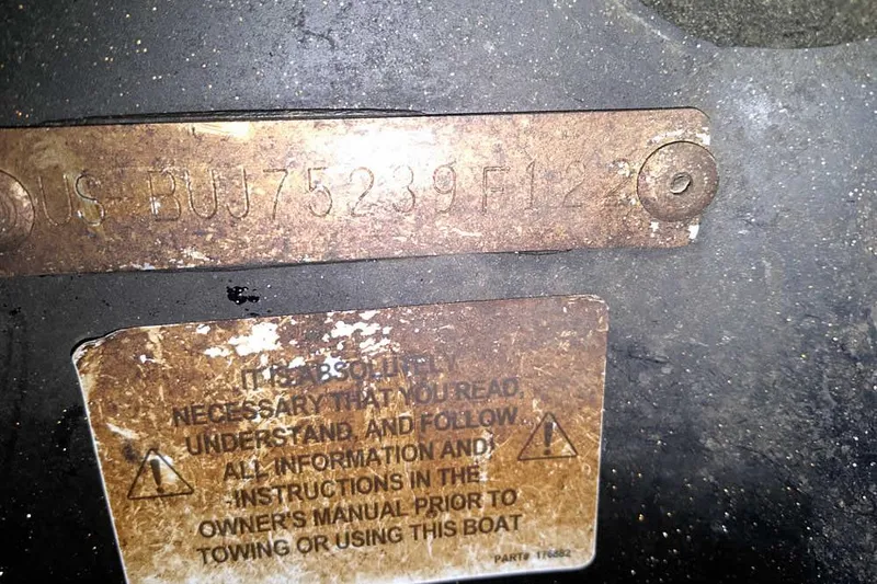 Slide: The Image of Hull identification number on a 2022 Nitro Z20 boat with safety instructions. - 15