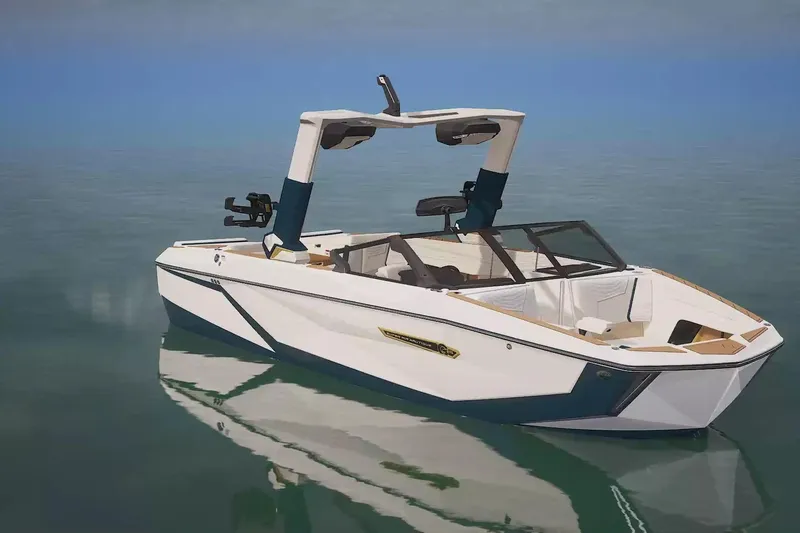 Slide: The Image of 2026 Nautique Super Air Nautique G25 boat on calm water, showcasing sleek design. - 11