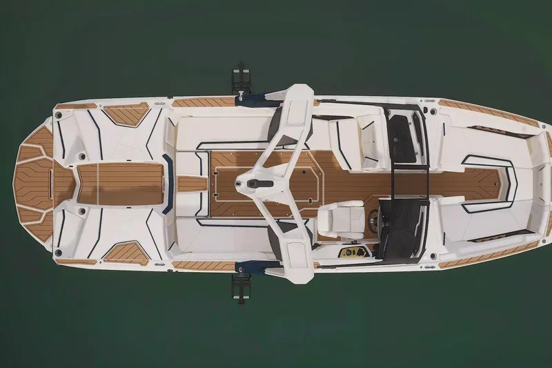 Slide: The Image of 2026 Nautique Super Air Nautique G25 boat, top view, sleek design, spacious interior. - 14