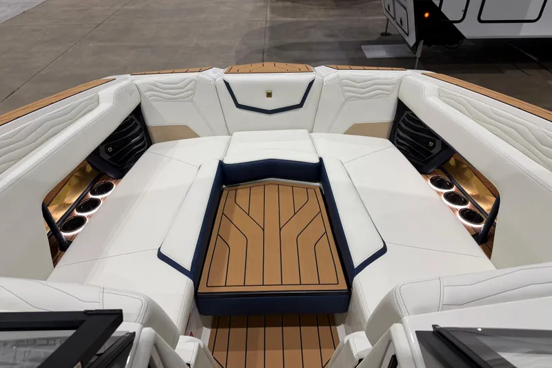 Slide: The Image of 2026 Nautique Super Air Nautique G25 interior with luxurious seating and modern design. - 6