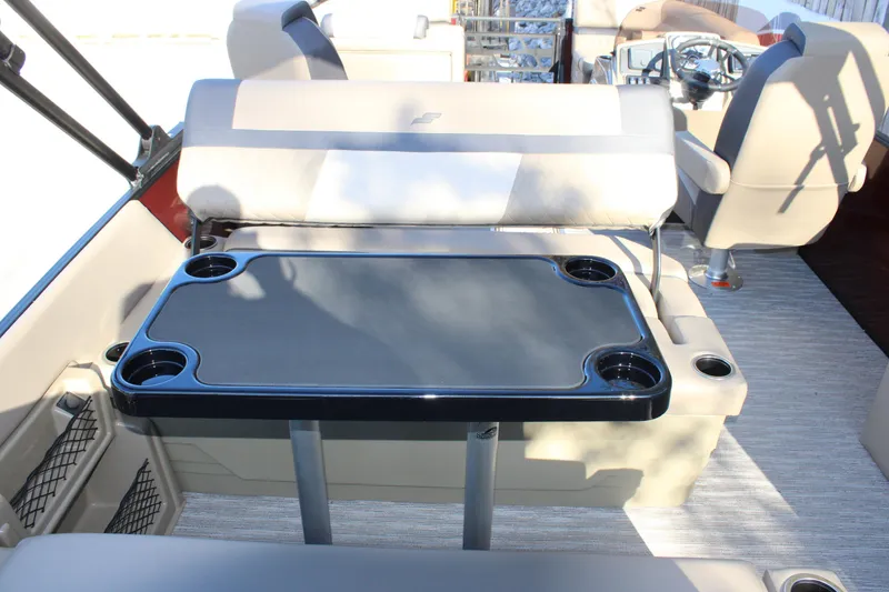 Slide: The Image of Interior of 2026 Starcraft EXS 3 DL boat with seating and table. - 10