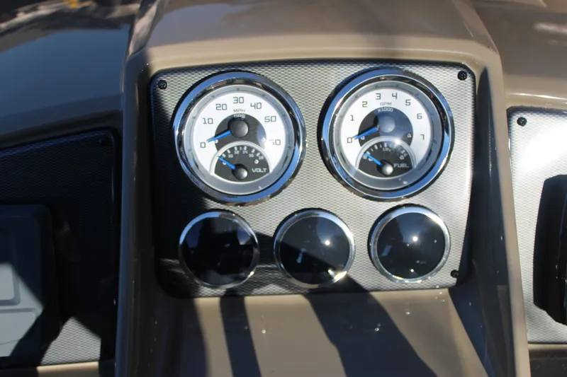 Slide: The Image of Dashboard of 2026 Starcraft EXS 3 DL with speedometer and fuel gauge. - 23