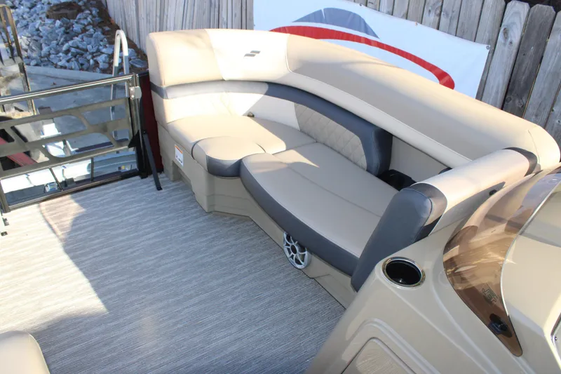 Slide: The Image of 2026 Starcraft EXS 3 DL boat interior with beige seating and modern design. - 30